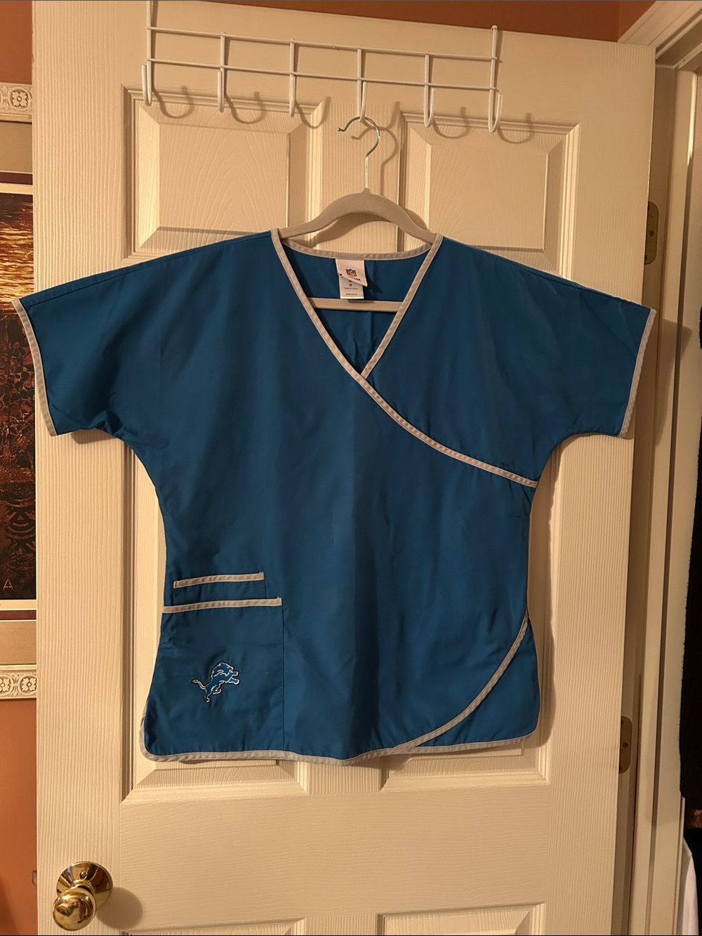 NFL Lions Honolulu Blue Scrub Top with Light Gray Trim